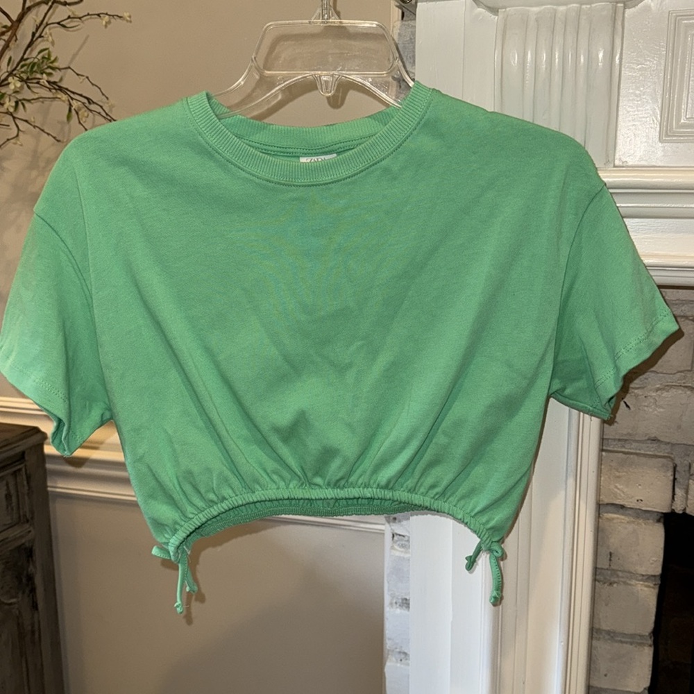 Green T-shirt with bows